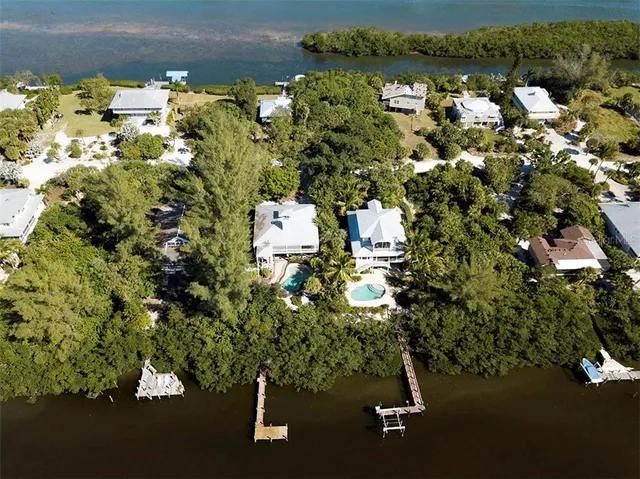 an aerial view of residential house with parking space