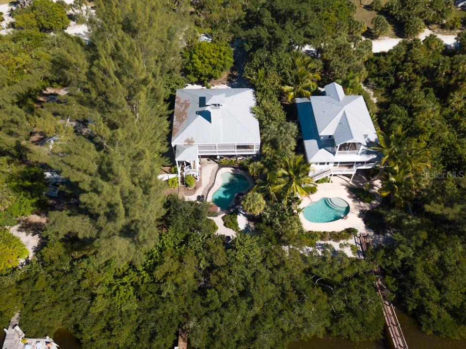 191 Kettle Harbor Drive Boca Grande, FL 33921 - Photo 50 of 50 an aerial view of a house with swimming pool and garden view