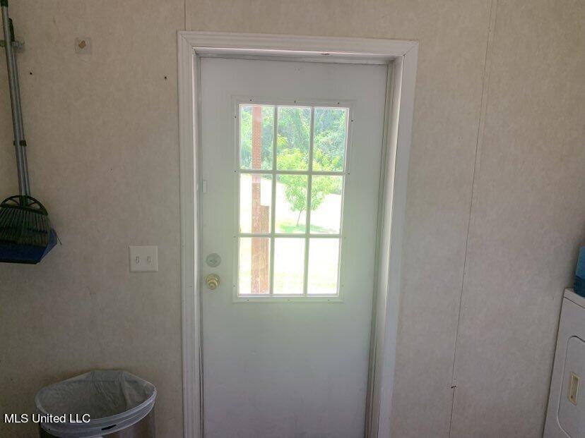 22720 East 18th Highway Raleigh, MS 39153 - Photo 13 of 41 Side exterior door off kitchen door