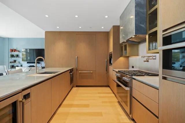 a dining room with a table and chairs