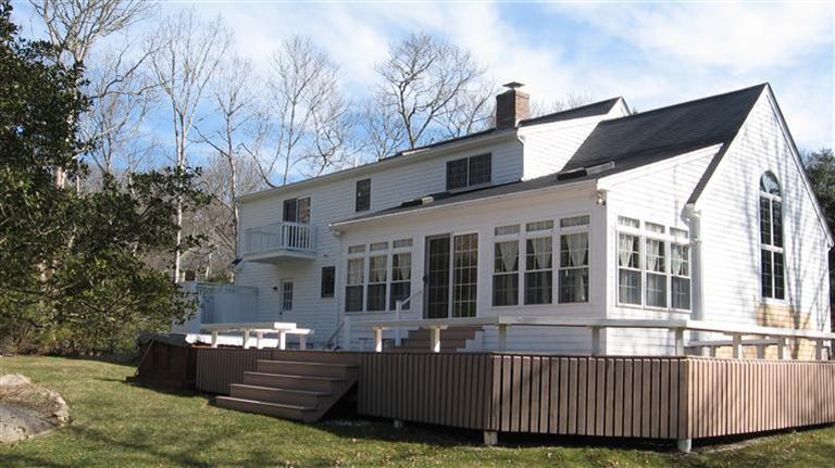 46 Hane Road Marstons Mills, MA 02648 - Photo 3 of 32 a view of a house with a backyard