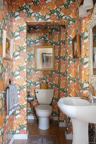 a bathroom with a toilet and a sink