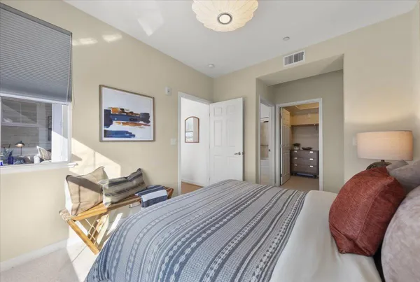 a living room with furniture and a gate
