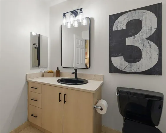 a view of a hallway with washer and dryer
