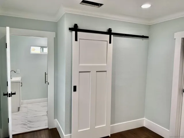 a bathroom with a sink and shower