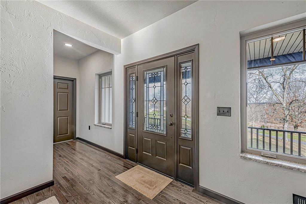 320 Highway 31 Ruffs Dale, PA 15679 - Photo 14 of 19 wooden floor with a mirror
