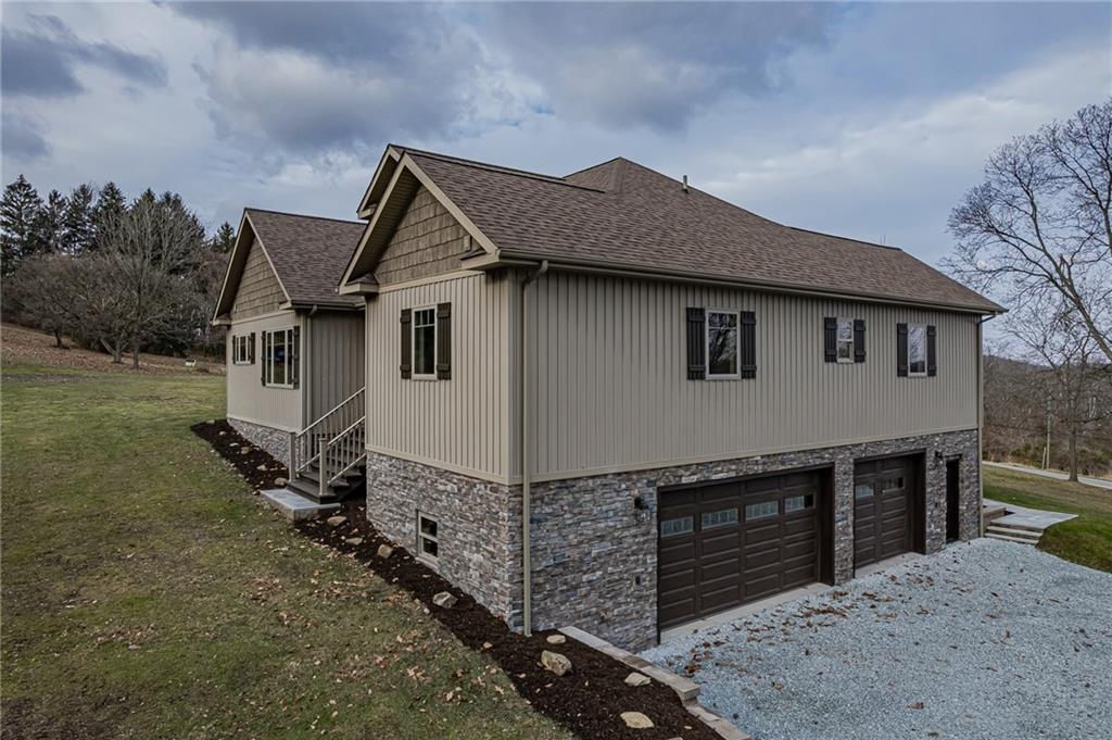 320 Highway 31 Ruffs Dale, PA 15679 - Photo 6 of 19 a house view with a outdoor space