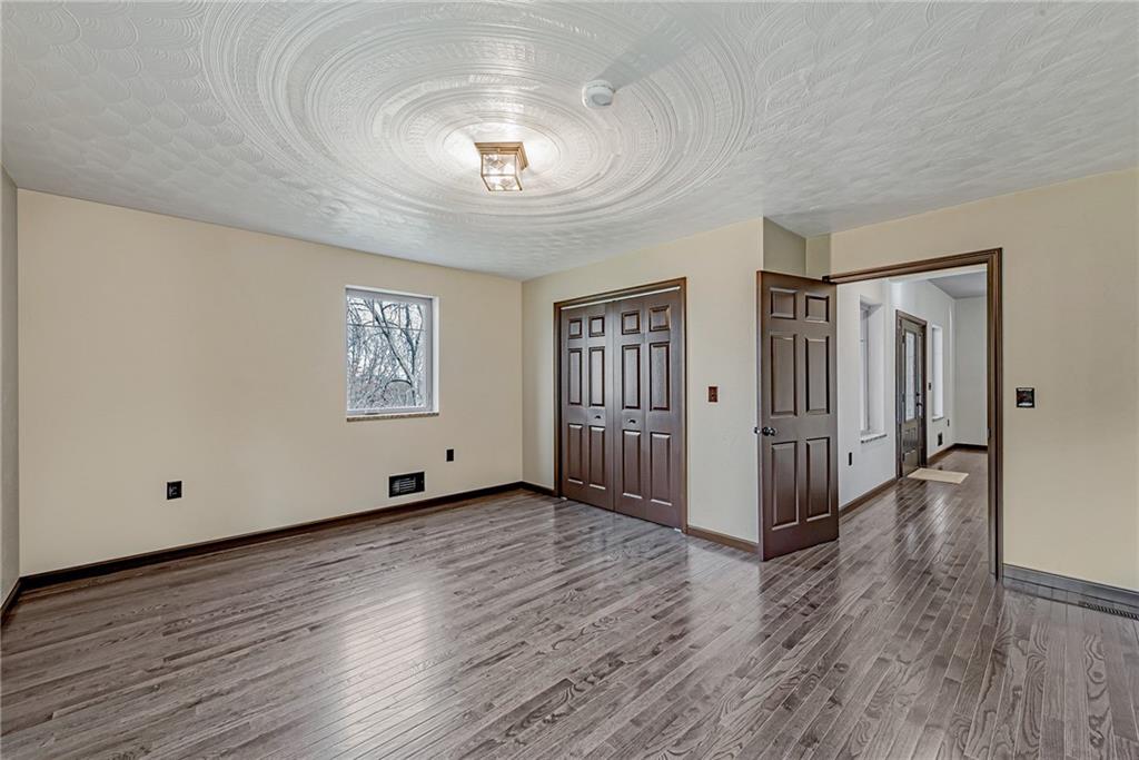320 Highway 31 Ruffs Dale, PA 15679 - Photo 7 of 19 a view of a livingroom with wooden floor and windows