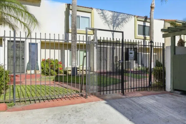a view of a balcony with a floor to ceiling window