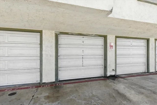 a picture of a bench in front of a wall