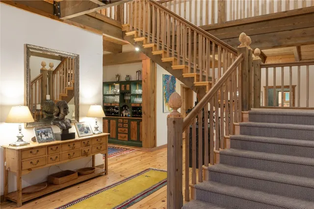 a view of a patio with a table and chairs
