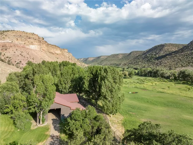 a view of a city with mountains in the background