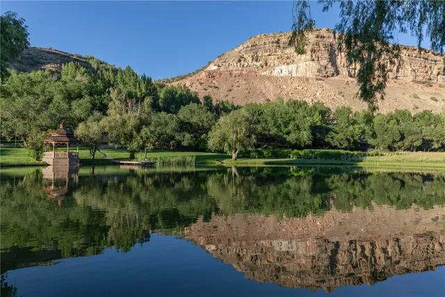 a view of a lake with a mountain in the background