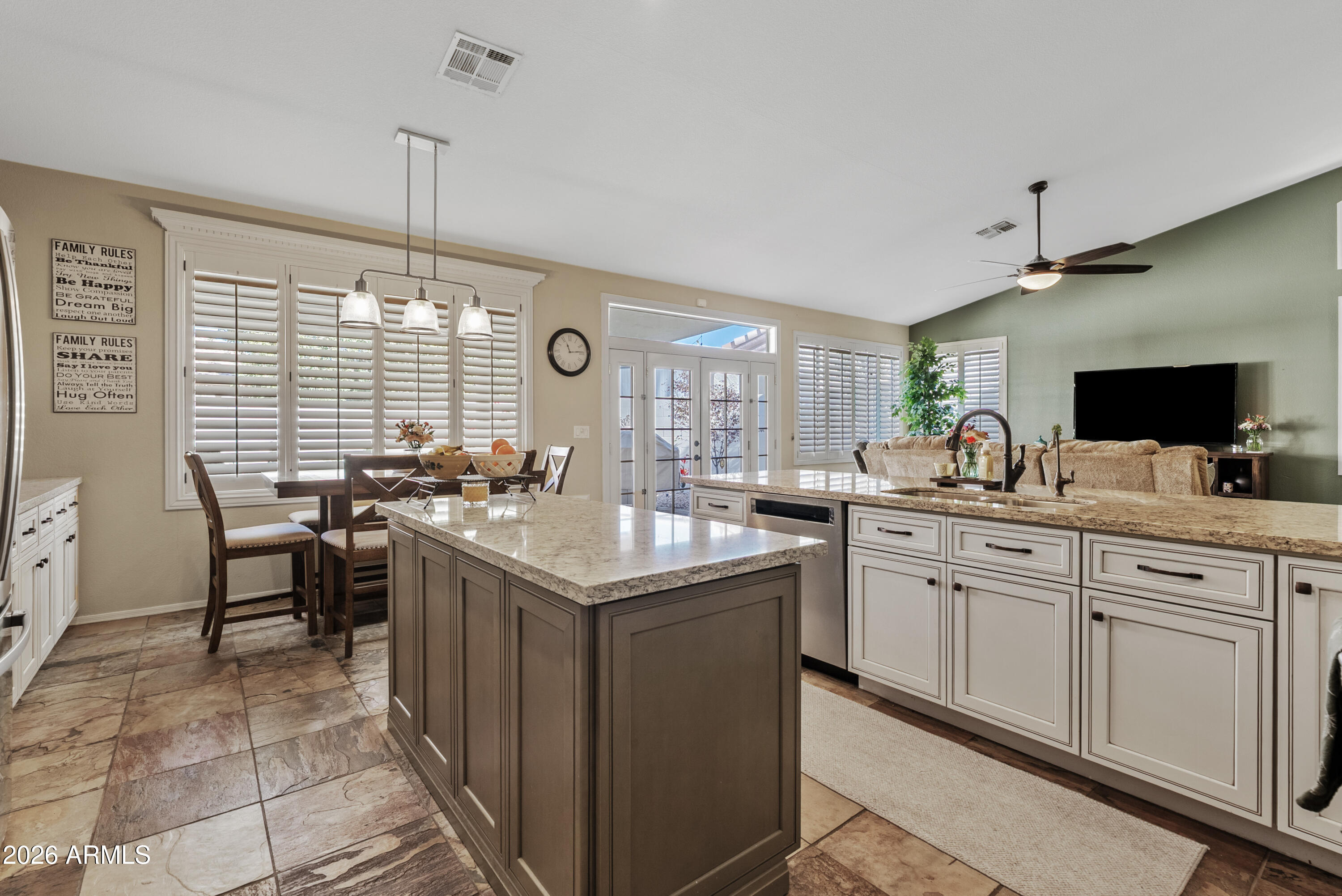 550 South Oak Street Gilbert, AZ 85233 - Photo 19 of 41 a kitchen with center island and sink