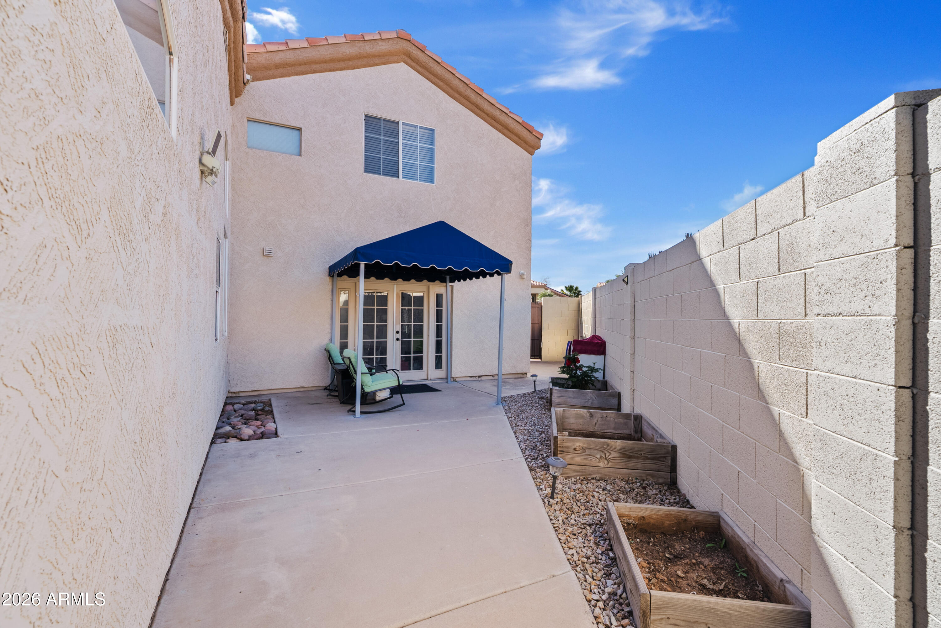 550 South Oak Street Gilbert, AZ 85233 - Photo 30 of 41 a view of a house with backyard and furniture