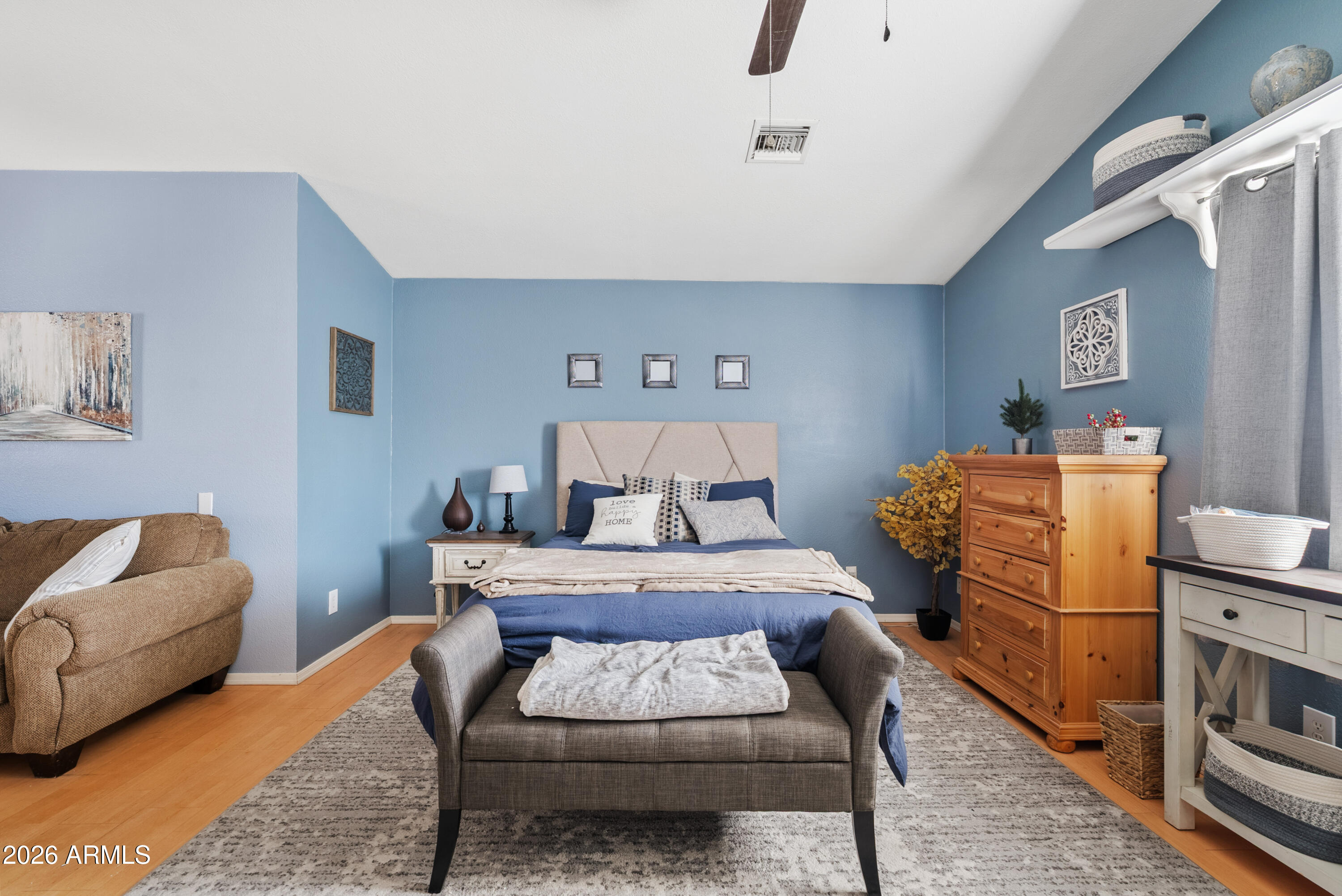 550 South Oak Street Gilbert, AZ 85233 - Photo 38 of 41 a bedroom with furniture and a couch