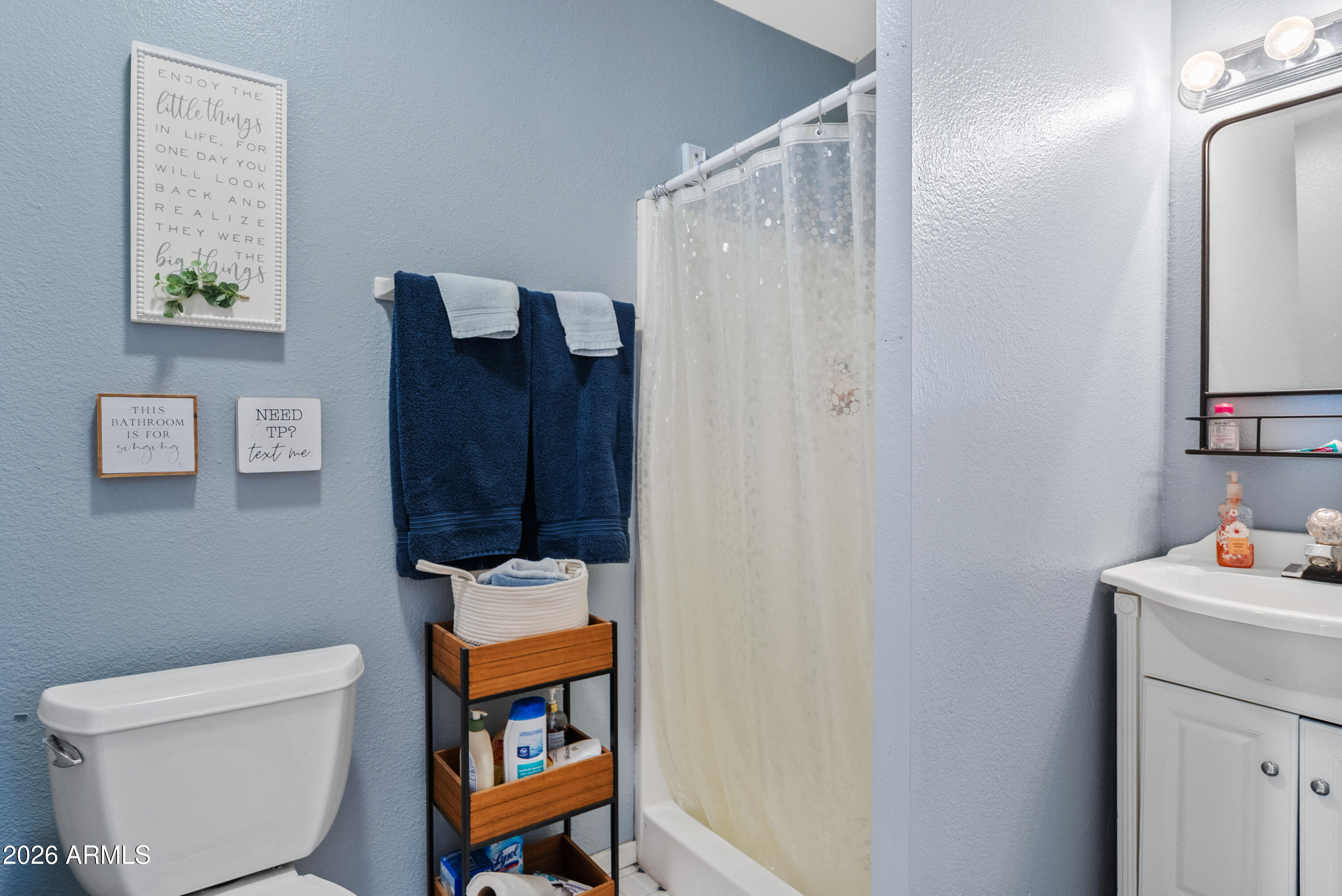 550 South Oak Street Gilbert, AZ 85233 - Photo 41 of 41 a bathroom with a toilet a sink and shower