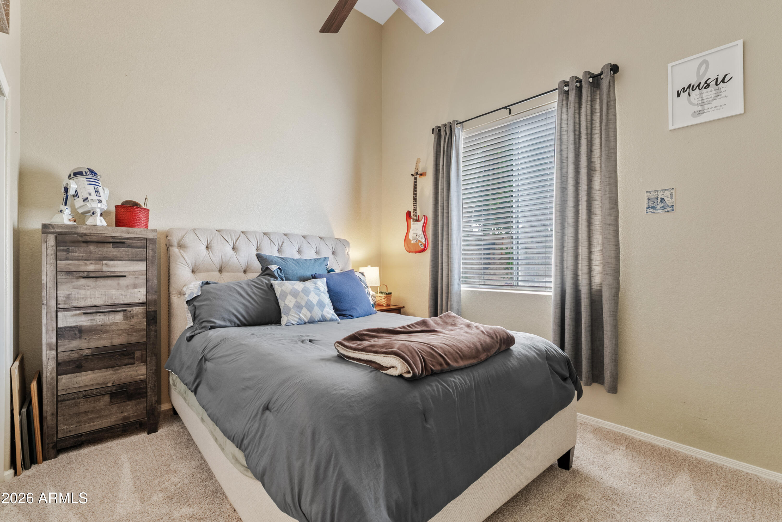 550 South Oak Street Gilbert, AZ 85233 - Photo 8 of 41 a bedroom with a bed and a window