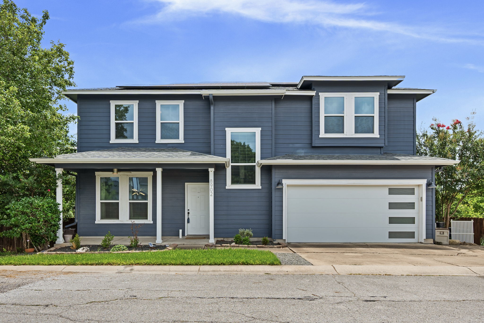 8902 Magna Carta Loop, Unit 122 Austin, TX 78754 - Photo 1 of 39 A classic gray exterior with white trim details offers a welcoming facade.