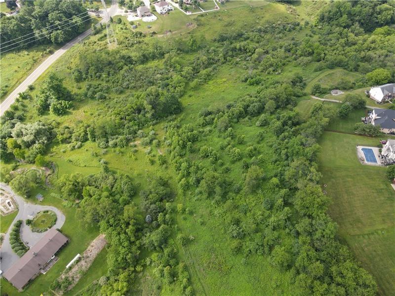 7549 Franklin Road Cranberry Township, PA 16066 - Photo 13 of 16 a view of a forest with a houses