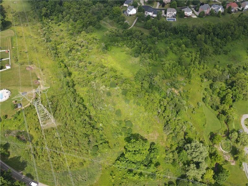 7549 Franklin Road Cranberry Township, PA 16066 - Photo 6 of 16 a view of a big yard with plants and large trees