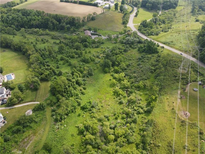 7549 Franklin Road Cranberry Township, PA 16066 - Photo 7 of 16 a view of a lake view with a garden