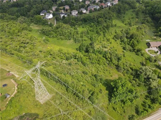 a view of a lake with a yard
