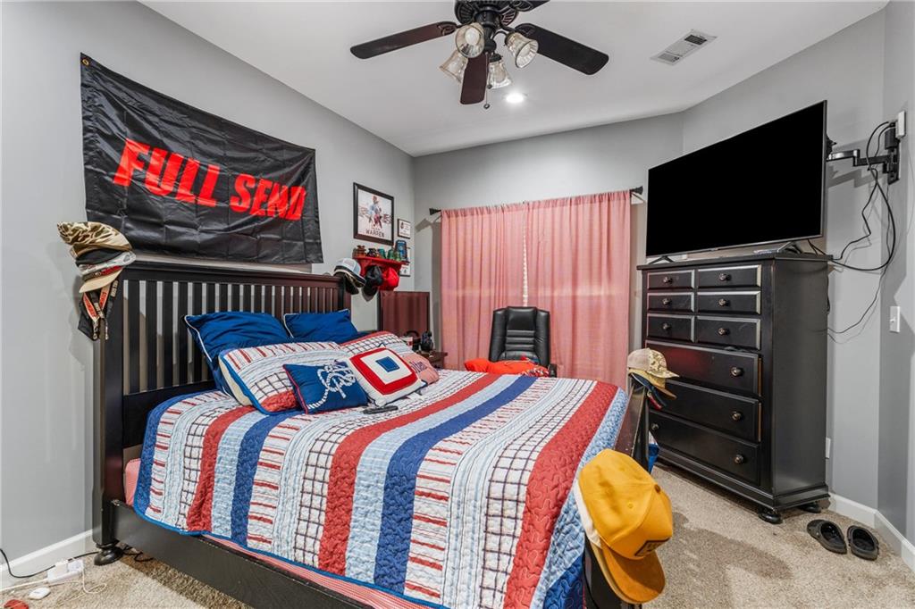 642 Nuckols Road Seale, AL 36875 - Photo 35 of 48 Carpeted room with a ceiling fan, recessed lighting, and a wall-mounted television