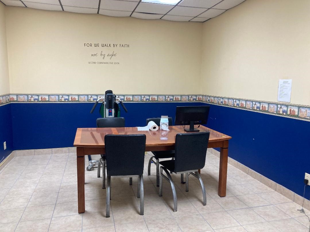 11001 Fondren Road, Unit A Houston, TX 77096 - Photo 4 of 15 a view of a dining room with furniture and wooden floor