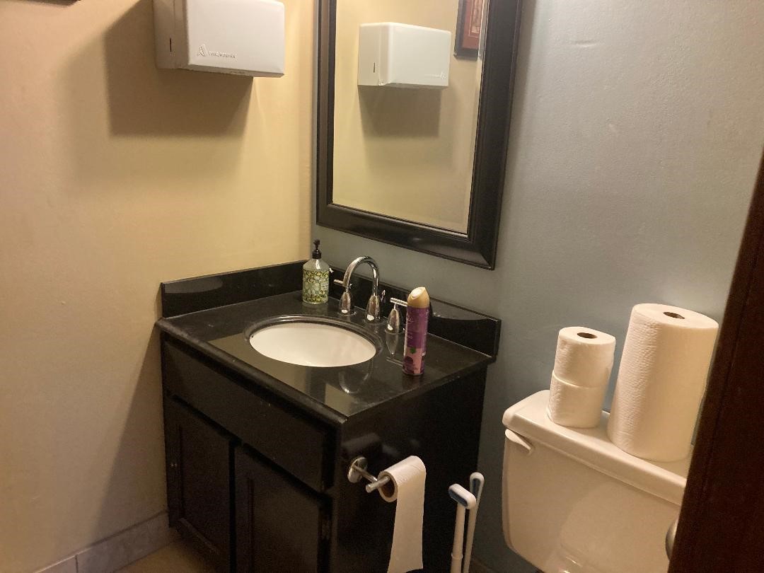 11001 Fondren Road, Unit A Houston, TX 77096 - Photo 10 of 15 a bathroom with a sink and a mirror