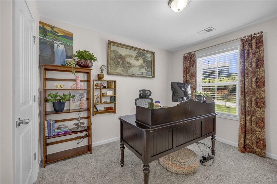 430 Johnson Road Central, SC 29630 - Photo 19 of 36 An inviting work-from-home space, bathed in natural light, offers peaceful productivity.