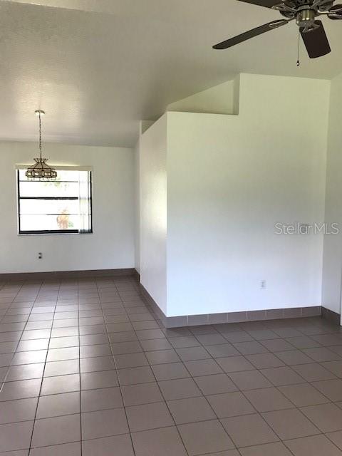 25385 Sandhill Boulevard, Unit E1 Punta Gorda, FL 33983 - Photo 11 of 16 a view of a hallway with closet