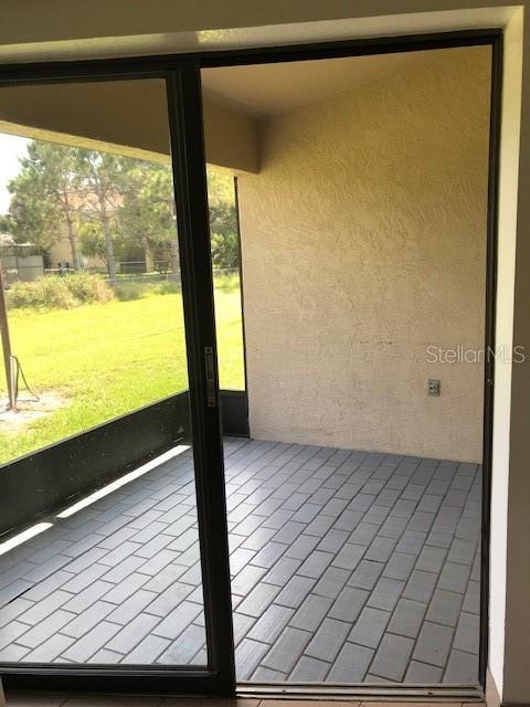 25385 Sandhill Boulevard, Unit E1 Punta Gorda, FL 33983 - Photo 15 of 16 a view of an empty room and window