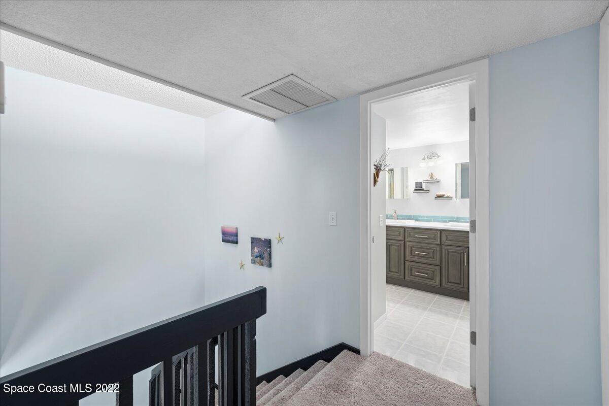 2012 Dan Court Palm Bay, FL 32905 - Photo 20 of 22 a view of walk in closet with clothes