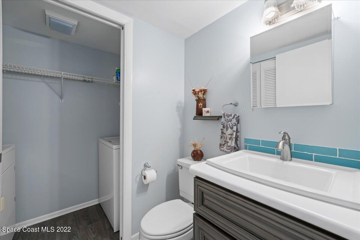 2012 Dan Court Palm Bay, FL 32905 - Photo 22 of 22 a bathroom with a sink a toilet and vanity