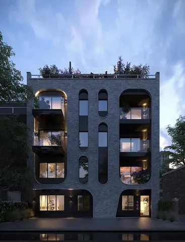 a backyard of a house with yard fire pit and outdoor seating