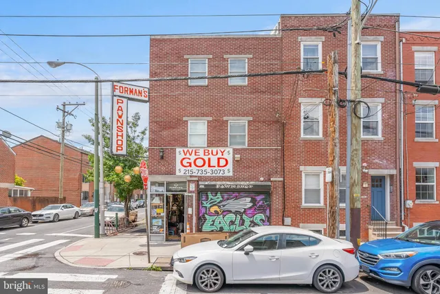 a car parked in front of a building