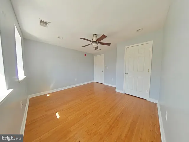 a view of a big room with carpet