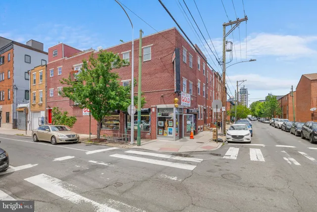 a view of a street with cars