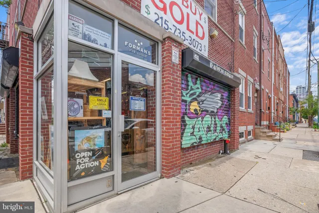 a view of a brick building with a large windows