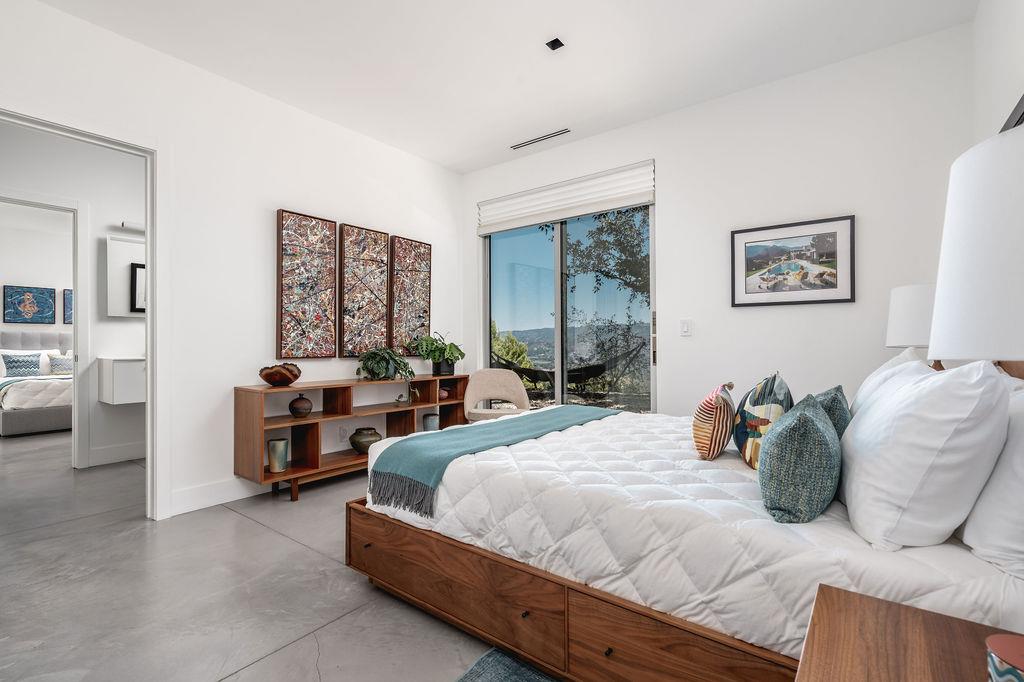 1465 Foothill Road Ojai, CA 93023 - Photo 24 of 34 a bedroom with a bed and furniture
