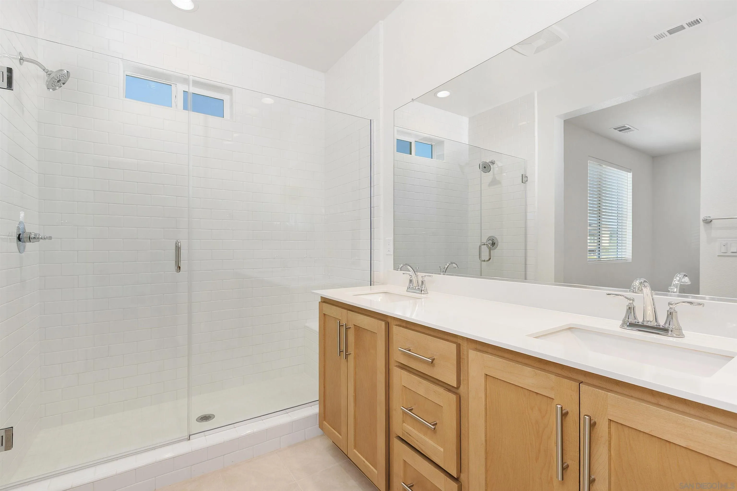 32336 Brunello Way Temecula, CA 92591 - Photo 13 of 26 a bathroom with a granite countertop sink mirror and double