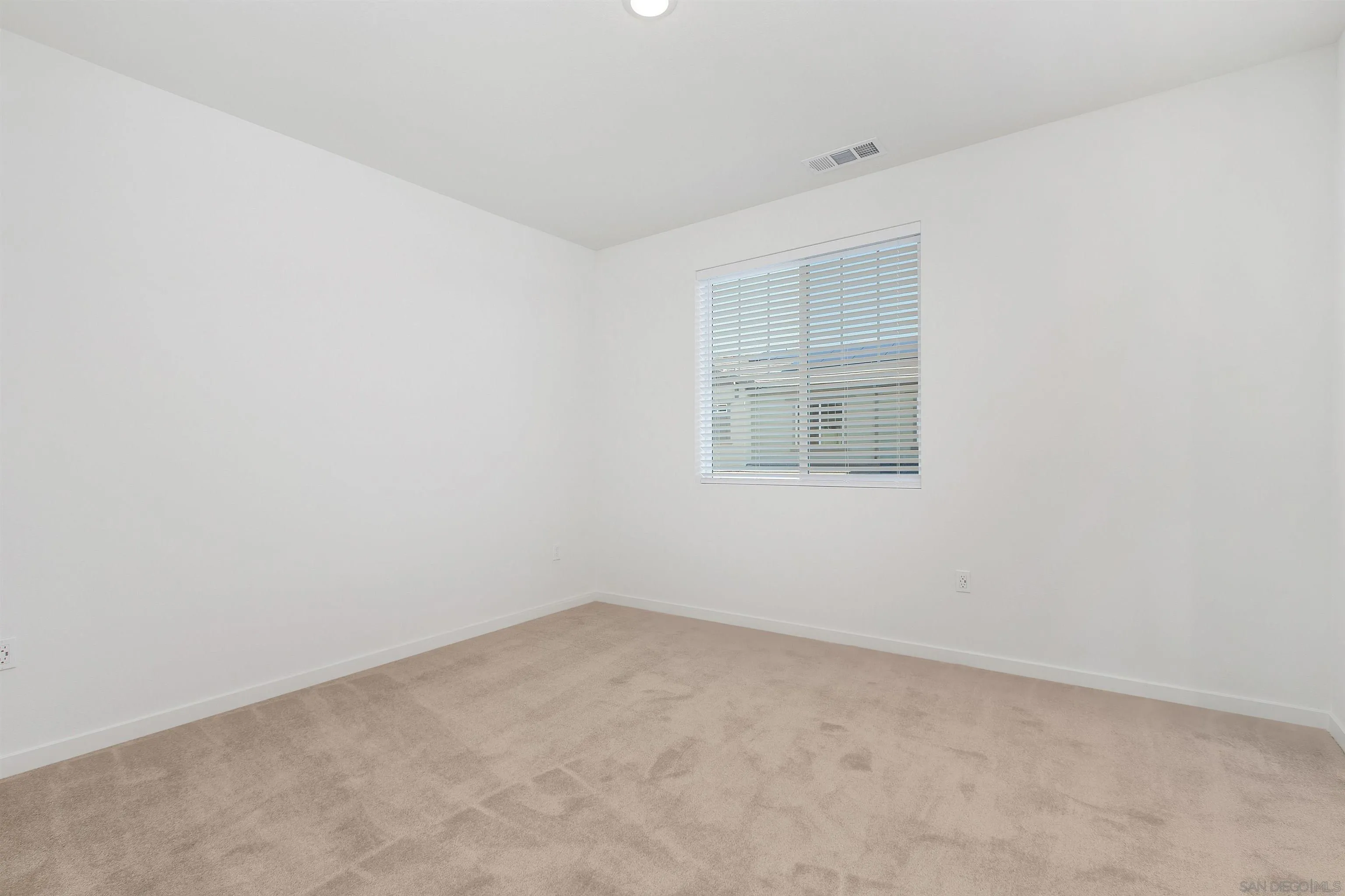 32336 Brunello Way Temecula, CA 92591 - Photo 16 of 26 an empty room with a window