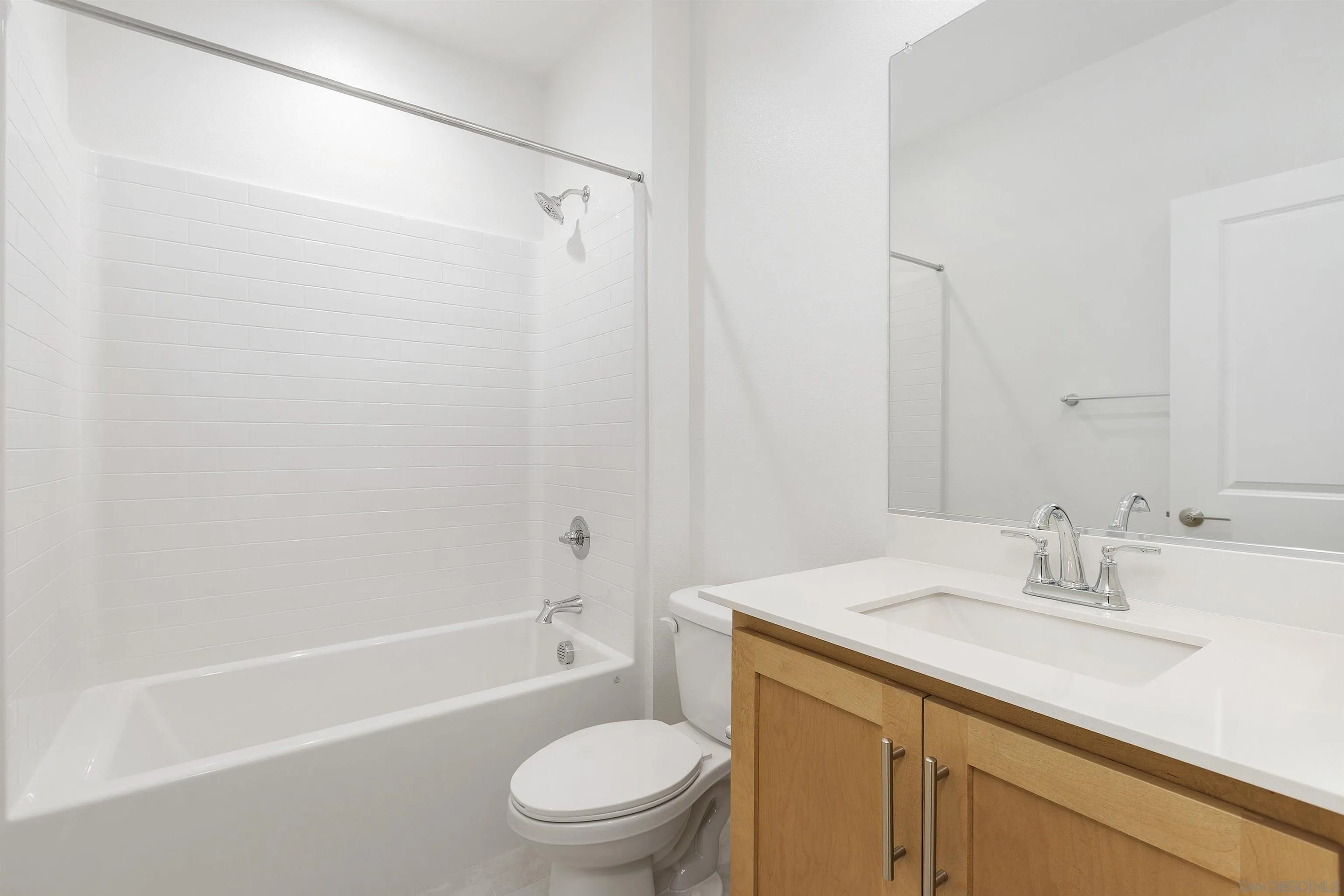 32336 Brunello Way Temecula, CA 92591 - Photo 17 of 26 a bathroom with a sink toilet and shower