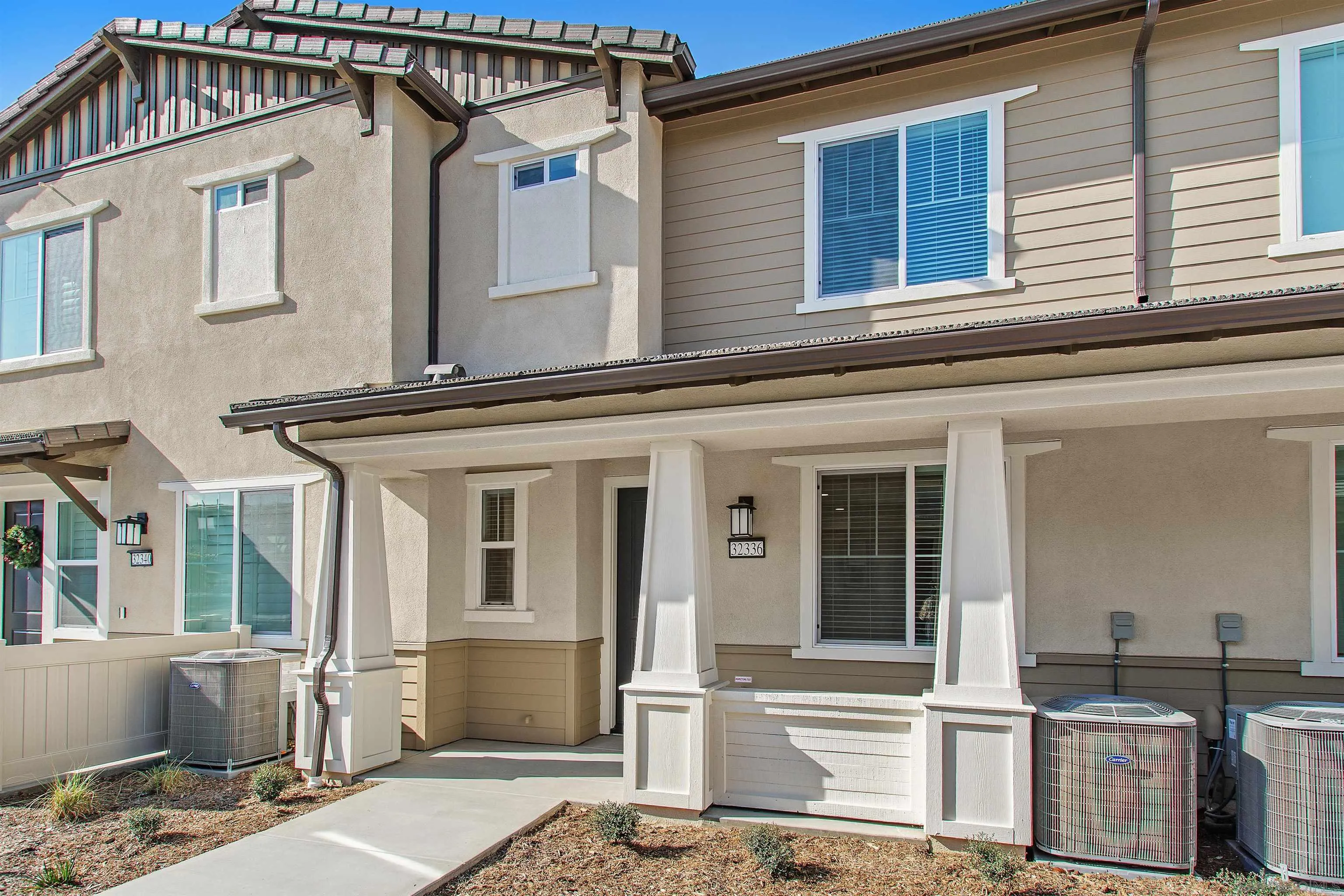 32336 Brunello Way Temecula, CA 92591 - Photo 25 of 26 a front view of a house with many windows