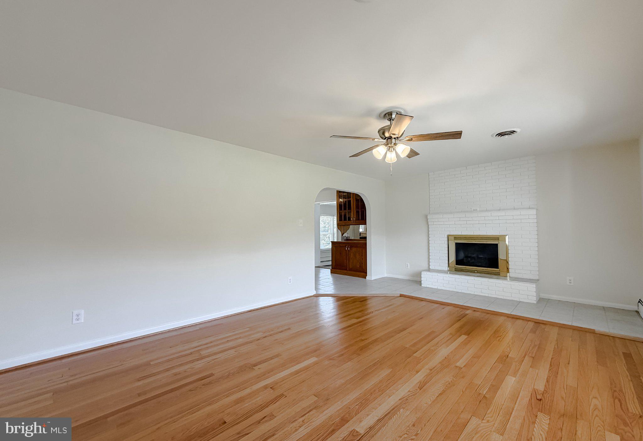 23230 Colton Point Road Avenue, MD 20609 - Photo 62 of 63 Spacious living area with warm tones.