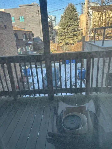 an empty room with wooden floor