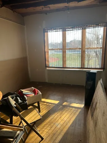 a room with hard wood flooring