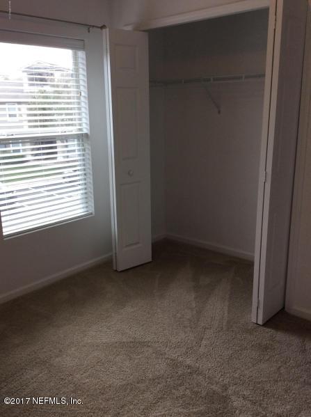 7920 Merrill Road, Unit 1009 Jacksonville, FL 32277 - Photo 11 of 22 a view of a room that has a window in it