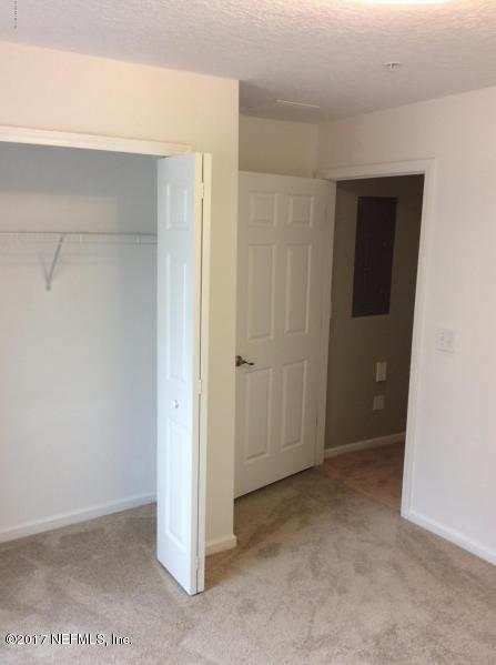 7920 Merrill Road, Unit 1009 Jacksonville, FL 32277 - Photo 12 of 22 a view of an empty room